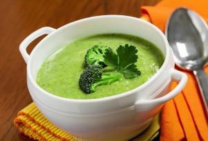 Soup with broccoli and melted cheese